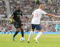 Manchester, England.10th June,2018.Yaya Toure and Wes Brownduring the Soccer Aid charity football match between an England X1 and a World X1. Each team of A-list celebrities and Sporting legends are fundraising for UNICEF.© Andy Gutteridge/ Image and Events/ Alamy Live News