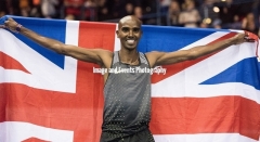 Mo Farah celebrates his victory in the 3000 mtrs at the Barclaycard Arena, Birmingham, England. The Muller Indoor Grand Prix.
