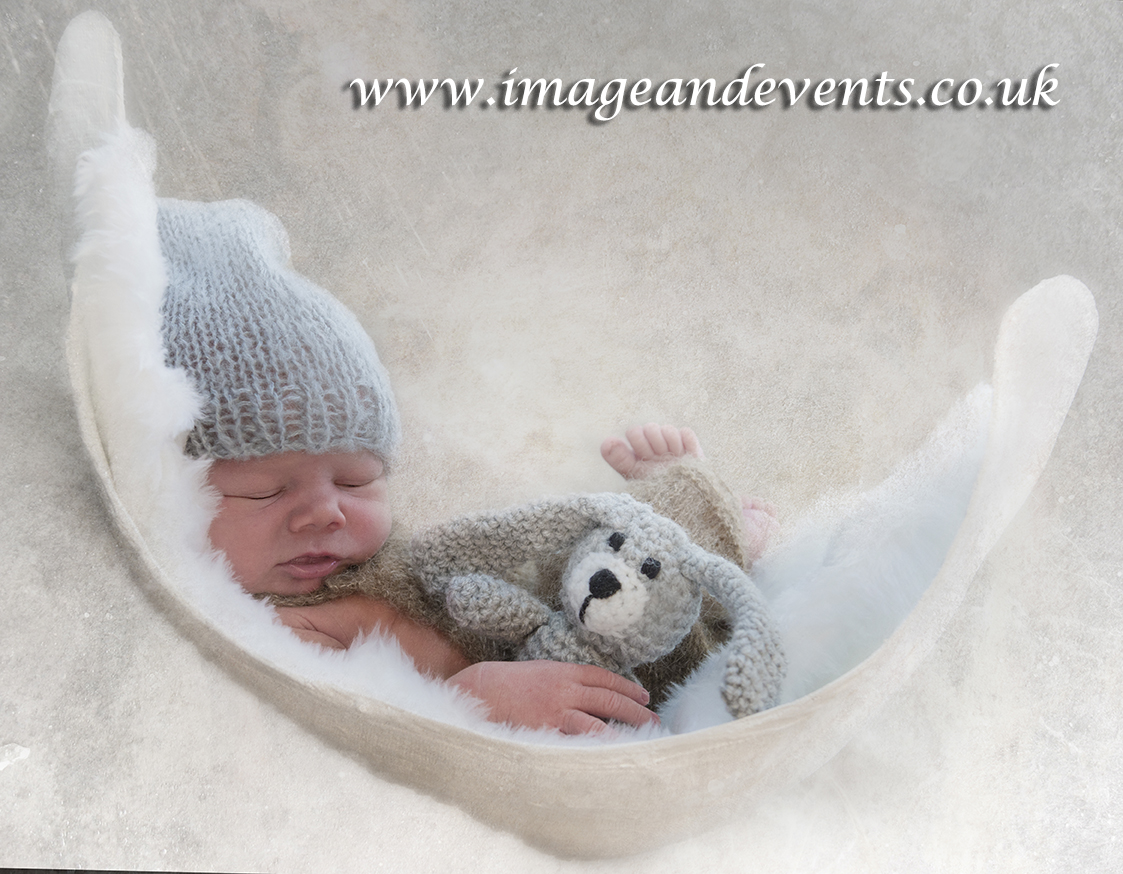 Draped Newborn baby photographed in the Peterborough studio